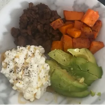Photographed plate: ground beef, roasted sweet potato, cottage cheese, and avocado